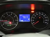 a close up of a car dashboard with a speedometer and gauges