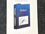 an image of a blue book with a picture of a bird on it