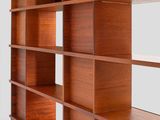 an image of a bookcase with many shelves in it