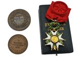 a book with a medal and a medal on it
