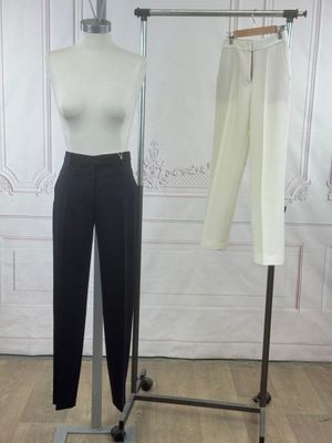 an image of a mannequin and pants on a stand