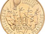 an image of a coin with a hot air balloon in the background
