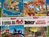 a lot of cartoon books on the table together