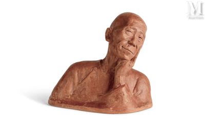 statue of an old man with his hand on his chin