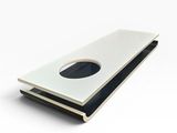 a white and black book with a hole in it