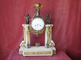 a clock that is sitting on top of a table