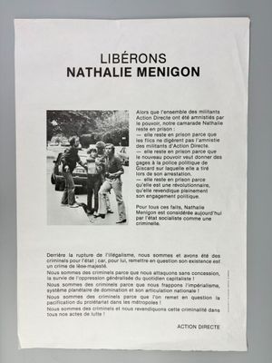 the sign is attached to the door of a building with a picture of a group of people