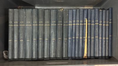 many books on the shelf in the box