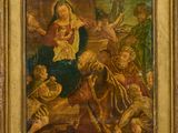 une peinture ancienne représentant une femme tenant un bébé dans ses bras