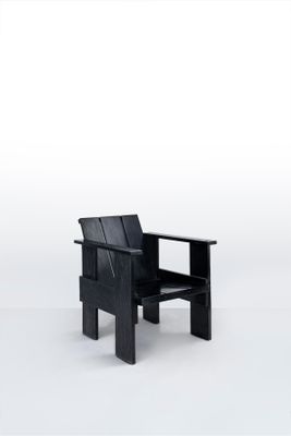 an image of a black chair sitting on top of a white floor