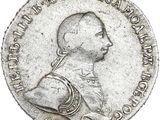 Gros plan sur une pièce de monnaie représentant un homme.