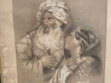 an old picture of a man and a woman in a turban