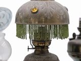 three lamps that are sitting next to each other on a table