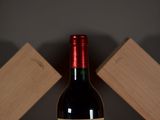 a bottle of wine that is sitting on a table
