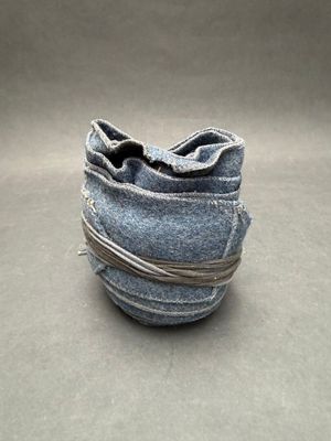 a small bag made out of a pair of jeans