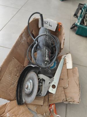 a box that has some tools in it on the floor