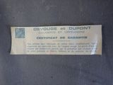the label on the back of a chair shows the name of the chair