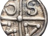 a close up of a silver coin on a white background