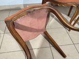 two chairs that are sitting next to each other on the floor