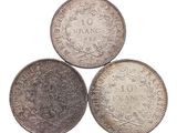 trois pièces d'argent portant les inscriptions « France » et « France »