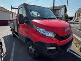 a picture of a red truck parked in a parking lot