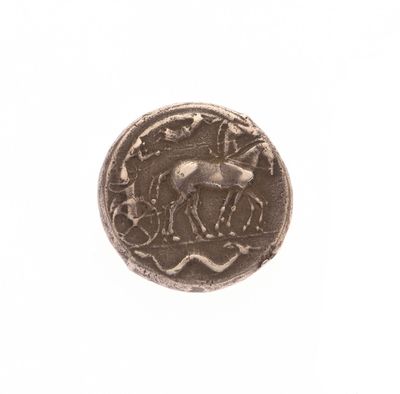 gros plan d'une pièce de monnaie sur laquelle figure un cheval