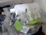 a plastic bag with a lot of items inside of it