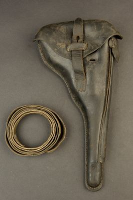 a small piece of leather with a cord and a leather case