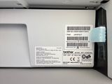 a close up of a printer with a barcode on it