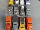 a lot of toy cars that are sitting on the floor