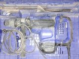 a blue box with tools in it on the floor