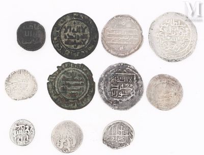 an image of a group of silver coins on a white surface