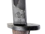 a close up of a knife with a wooden handle