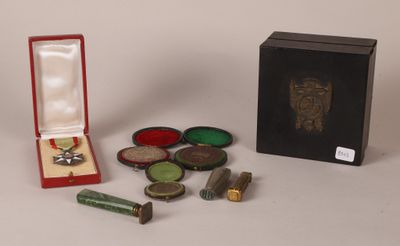 a small box with a lot of different items in it