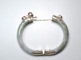 a picture of a bracelet that is on a table