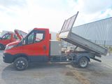a red truck that is parked in a parking lot