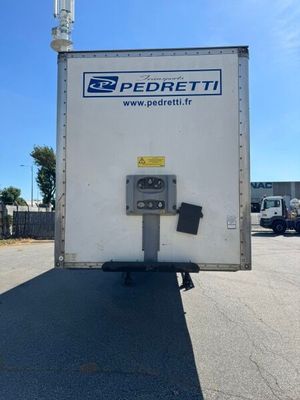 a delivery truck that is parked in a parking lot