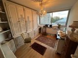 an image of a living room with a chandelier in it
