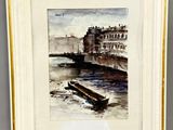 peinture d'un bateau sur un plan d'eau avec un bâtiment en arrière-plan