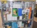 a metal cart with many items in it in a warehouse