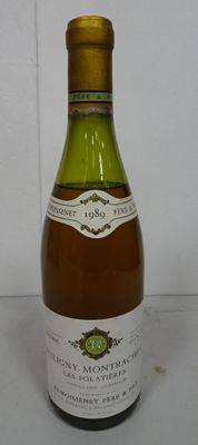 a bottle of wine that is sitting on a table