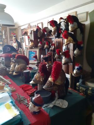 many stuffed animals on a table in a room