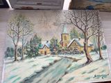 a painting of a church in the snow on a table