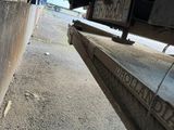 a close up view of a truck ' s wheels on the road