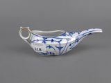 a blue and white porcelain bird shaped dish with a handle