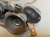 a close up of a pair of binoculars on a table
