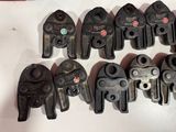 a lot of clamps that are on a table