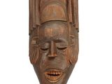 an image of a wooden mask on a white background