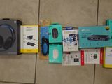 a lot of electronic items on the floor next to each other