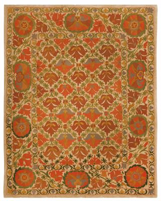 un tapis orange et vert orné d'un motif floral